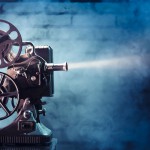old film projector with dramatic lighting old film projector with dramatic lighting